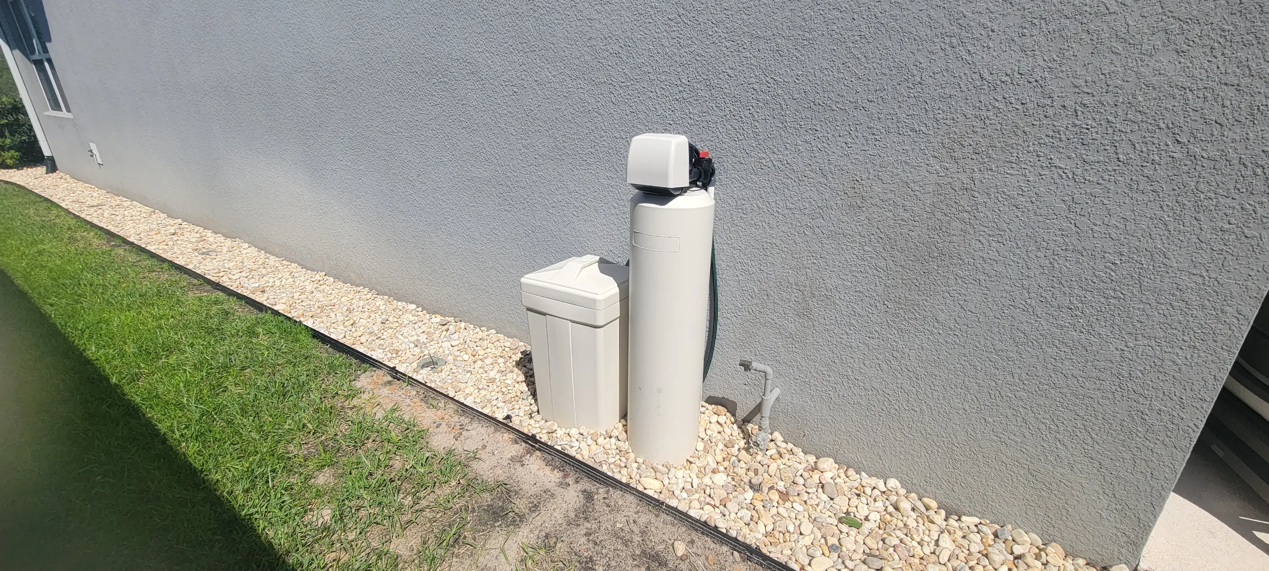 Completed outdoor Sunstorm Home water treatment system in Groveland, Florida